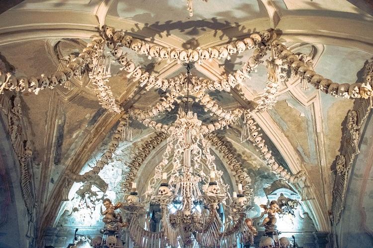 Interior of Sedlec Ossuary with bones hanging in Kutna Hora