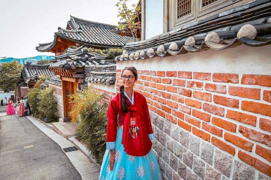 Foreign girl wearing a hanbok at Bukchon Hanok Village