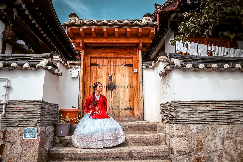 Foreign girl wearing a hanbok at Bukchon Hanok Village