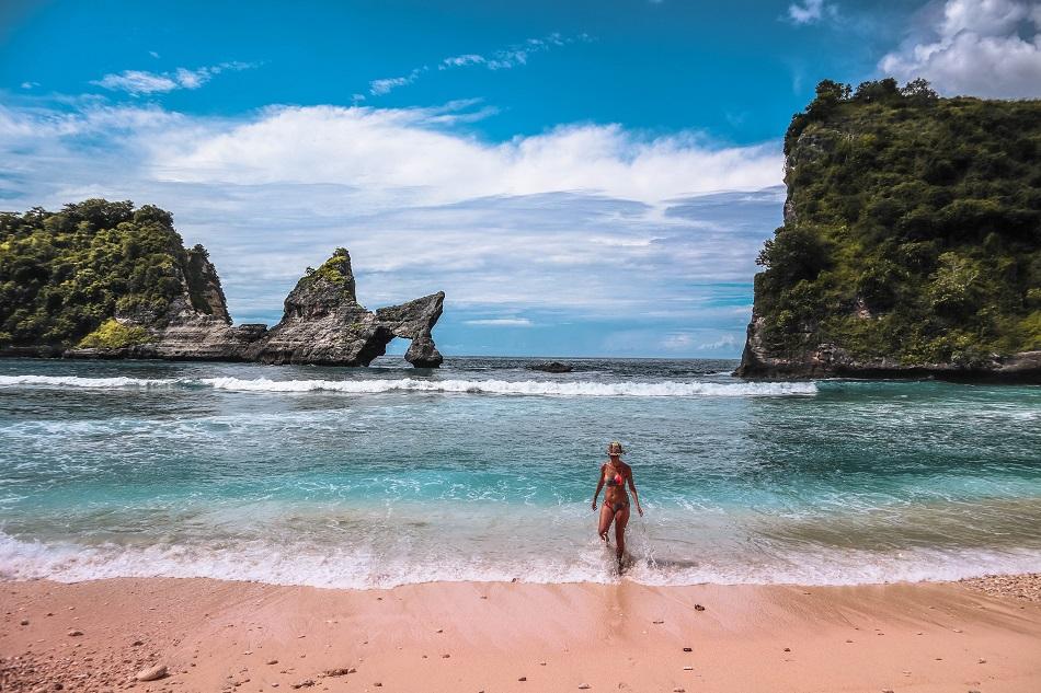 Girl on the beach at Atuh Beach, Nusa Penida