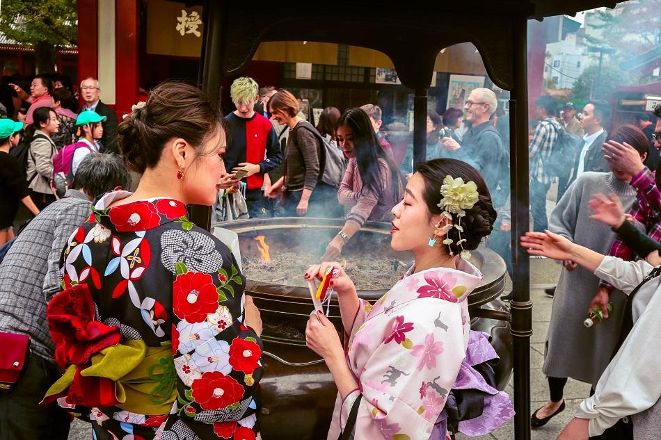 Japanese girls wearing a kimono in Tokyo at Senso-ji Temple